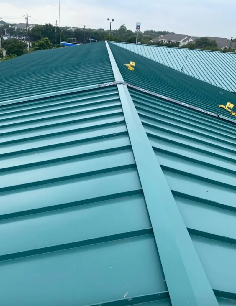Green commercial metal roof ridge and valley for Metal Roof Repair in Bartlett