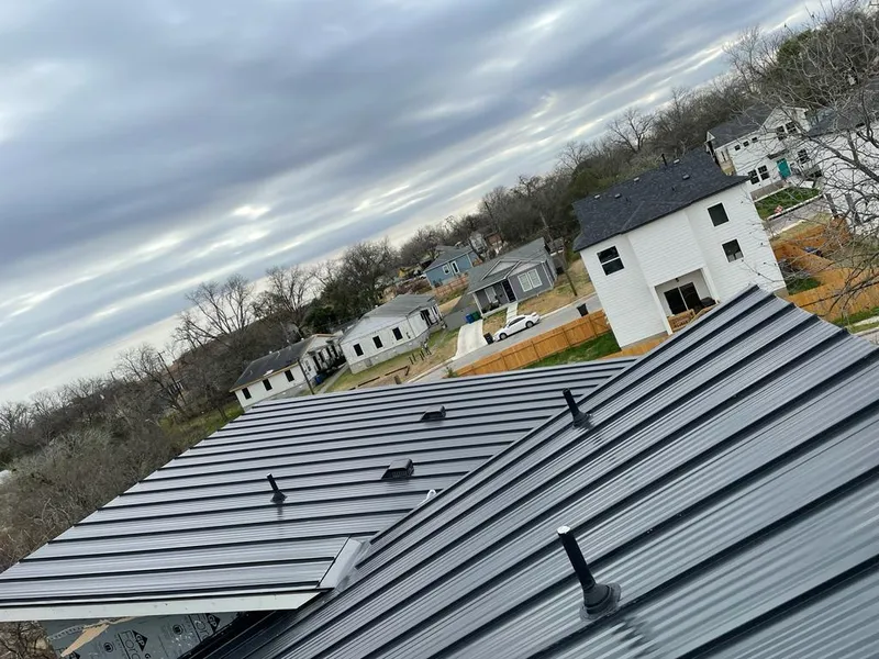 Standing seam metal roof panels with vents for Skylight Repair in Bartlett